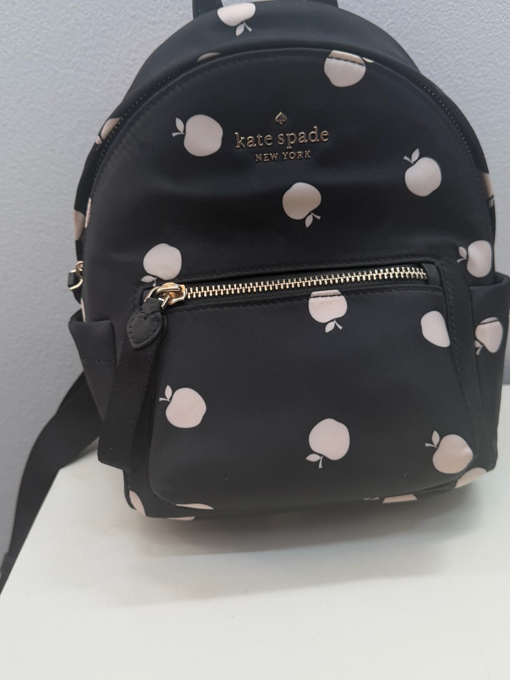 kate spade Black Mini Backpack with Pale Pink Apple Motif